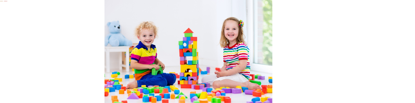 Child playing with building blocks to beat boredom